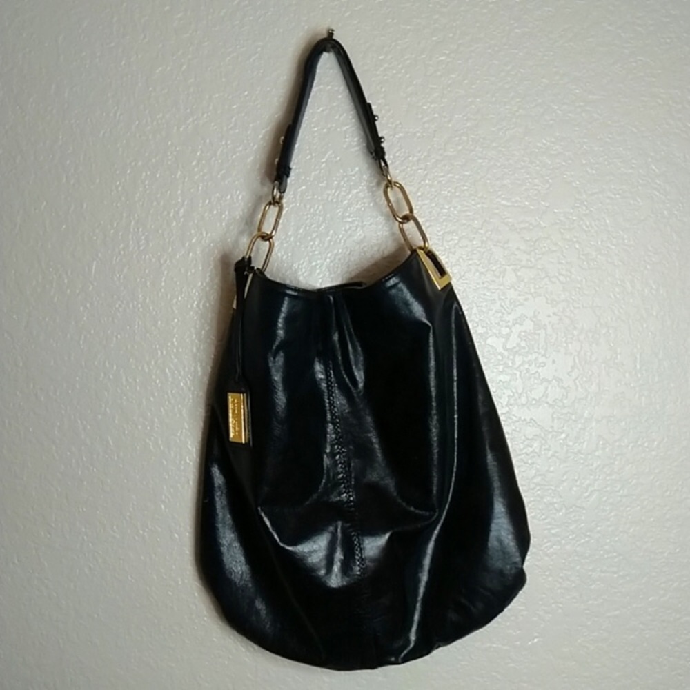 Badgley Mischka black leather lg hobo bag with gold hardware.